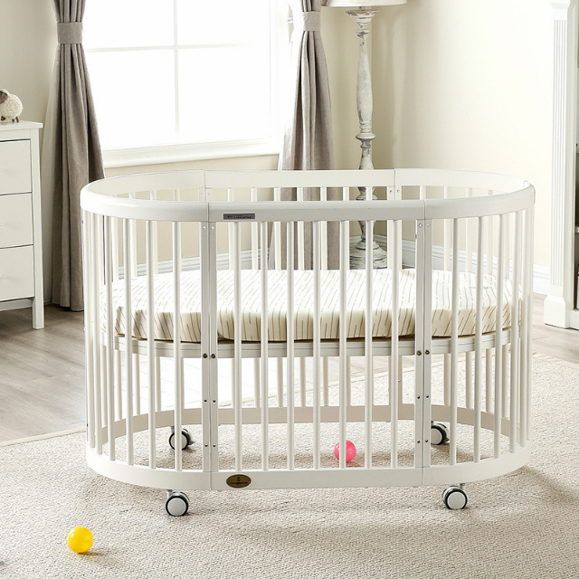 Emerald Round Oval Cot White Including sheets and Snuggletime Mattress