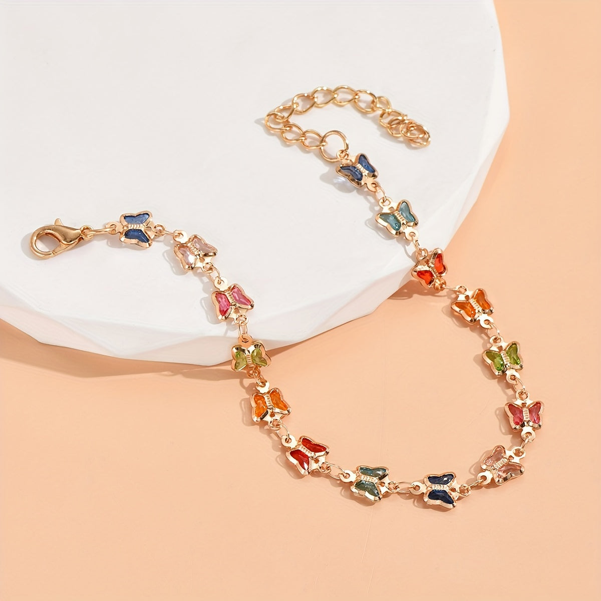 A Easy And Stylish Women'S Ankle Chain with a Randomly Colored Butterfly Design