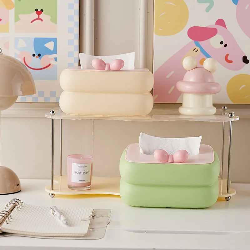 Cute spring-loaded automatic lift tissue box with large capacity storage.