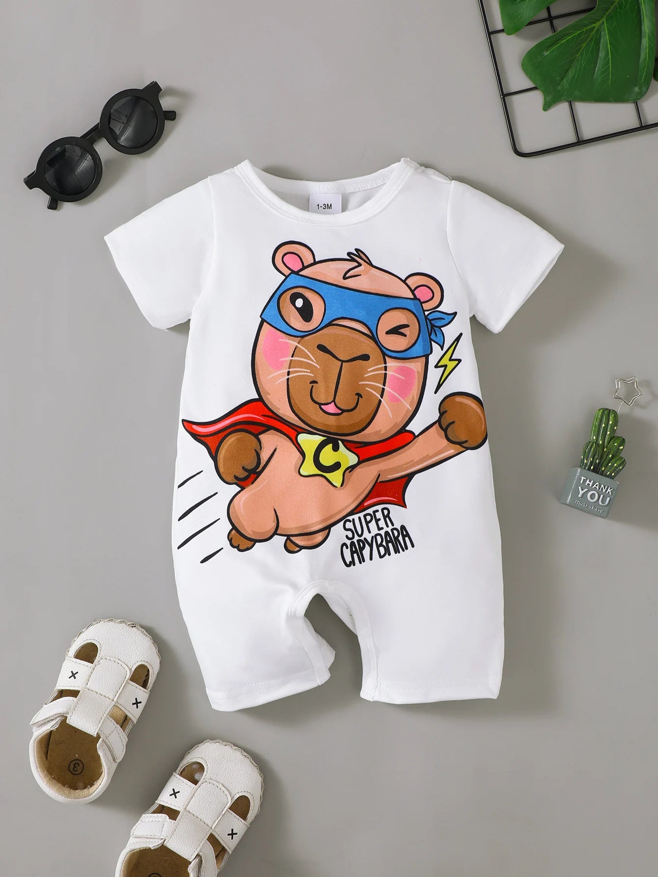 Newborn Male baby Summer Jumpsuit Superman Capybara Pattern Short sleeved Jumpsuit Suitable for Male Babies aged 0-18 Months