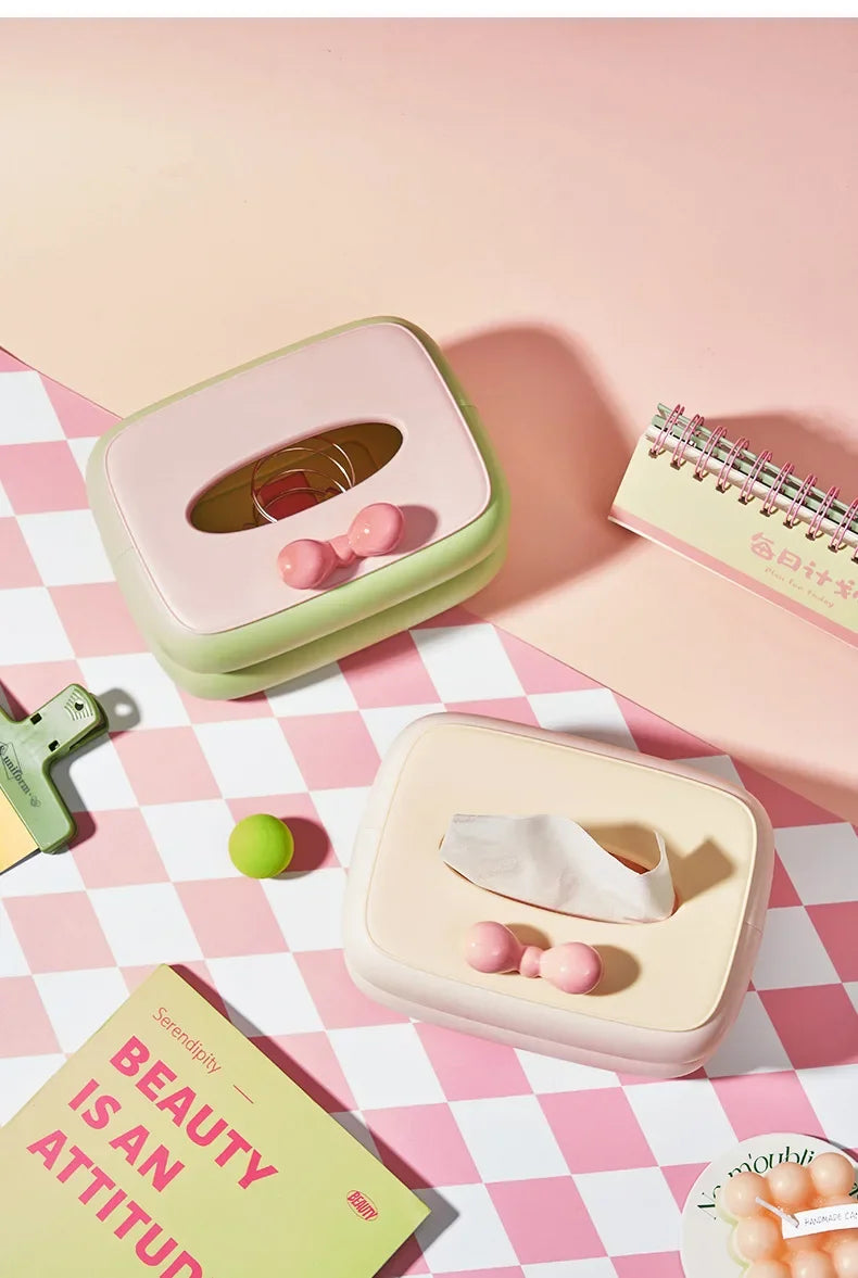 Cute spring-loaded tissue box with large capacity storage for desks and tables.