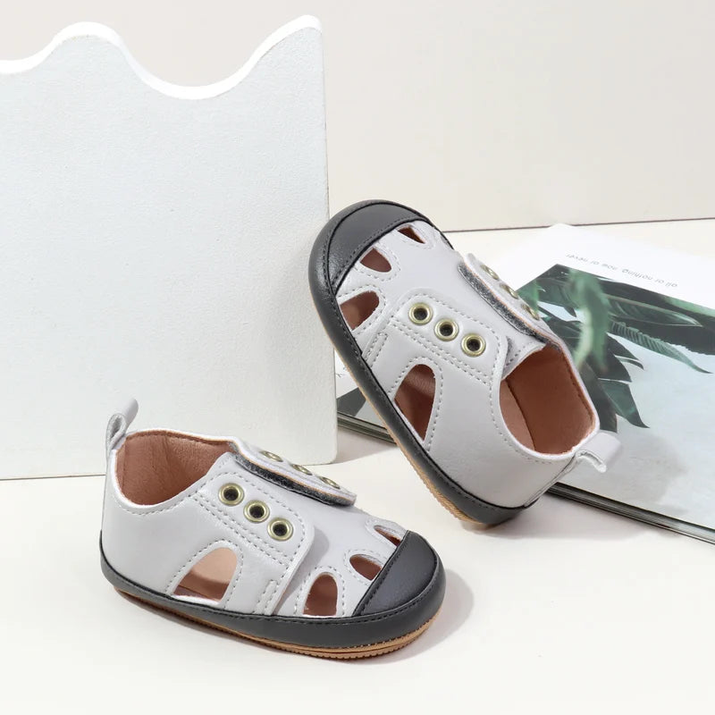Spring/Summer New Style Baby Shoes with Hollow Design for Good Air Circulation Soft and Anti-Slip Function for Learning Walkers