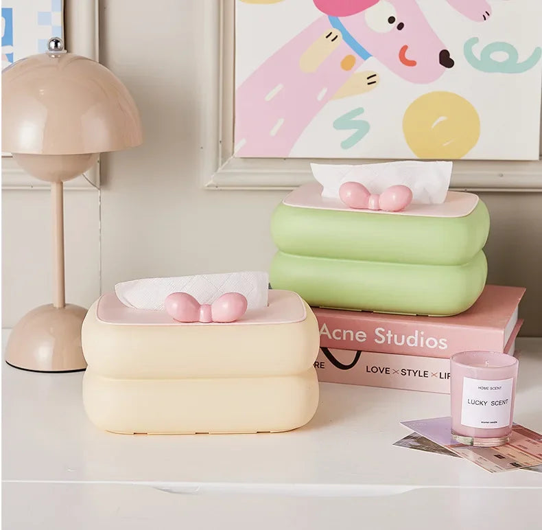 Cute spring-loaded automatic lift tissue box with large capacity storage.