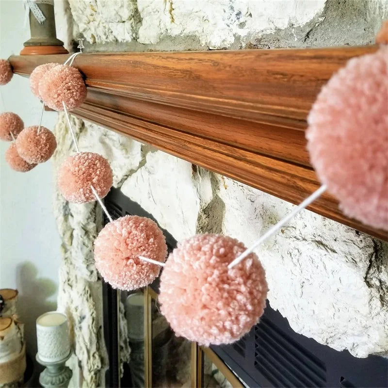 Farmhouse yarn ball spring wreath with white and pink felt banner for seasonal home decor