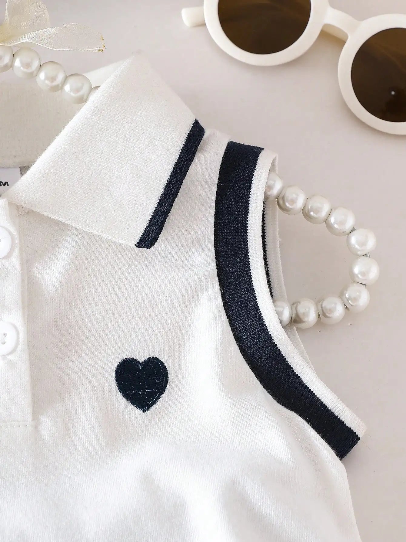 Two piece set of baby girl heart embroidered POLO collar sleeveless top and woven casual pleated short skirt with sweet and cool
