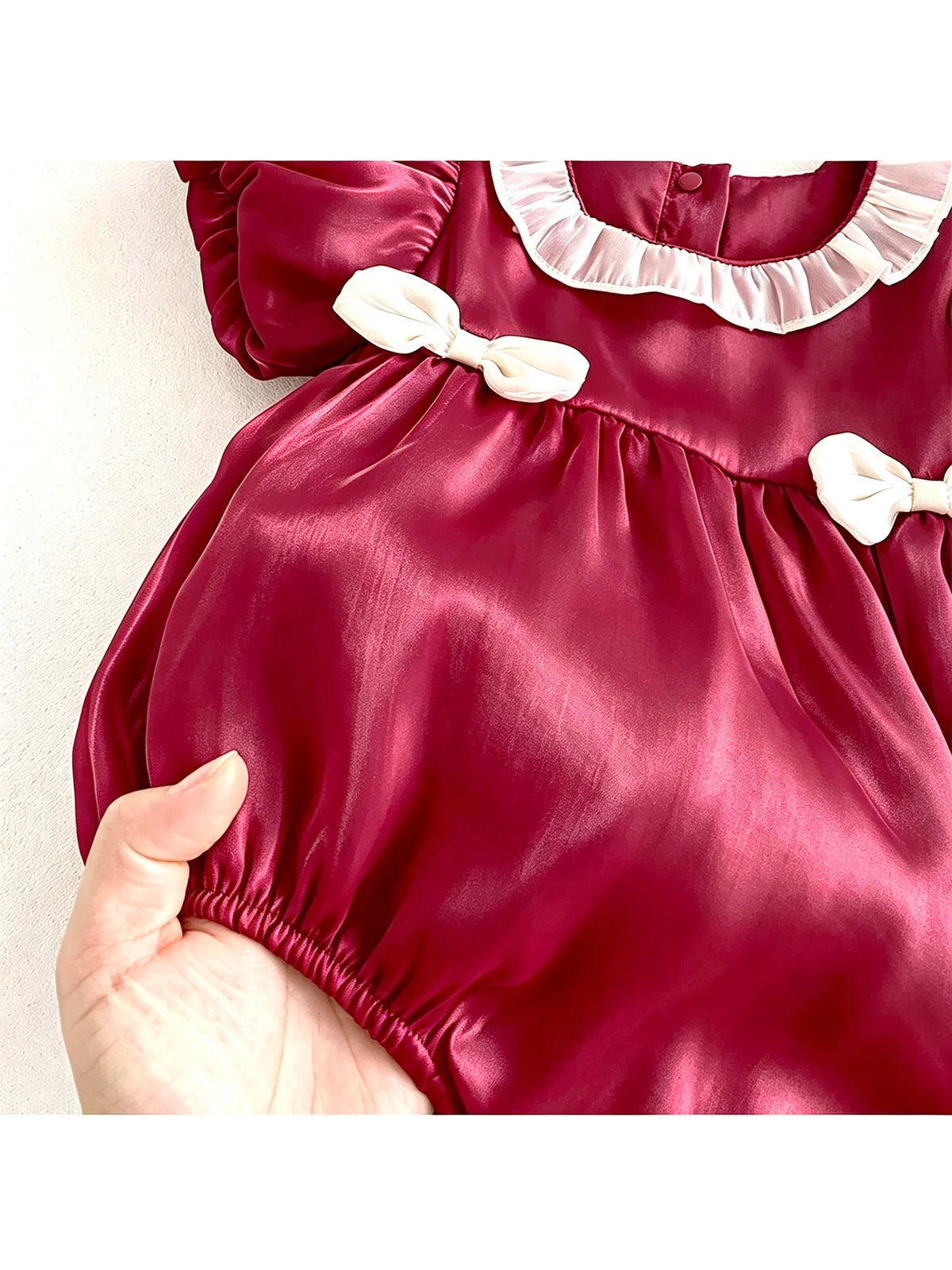 Baby-Fitting Ruffle-Collar, Cap-Sleeve, Bow-Tie Burgundy Baby Girl Onesie—Cute Spring/Summer Outfit for Newborns