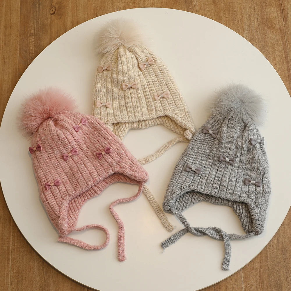 Princess Children Winter Hat for Girls Pompom Bows Kids Bonnet Hat Warm Ears Thicken Children Girl Cap Faux Fur Ball 2-6Y