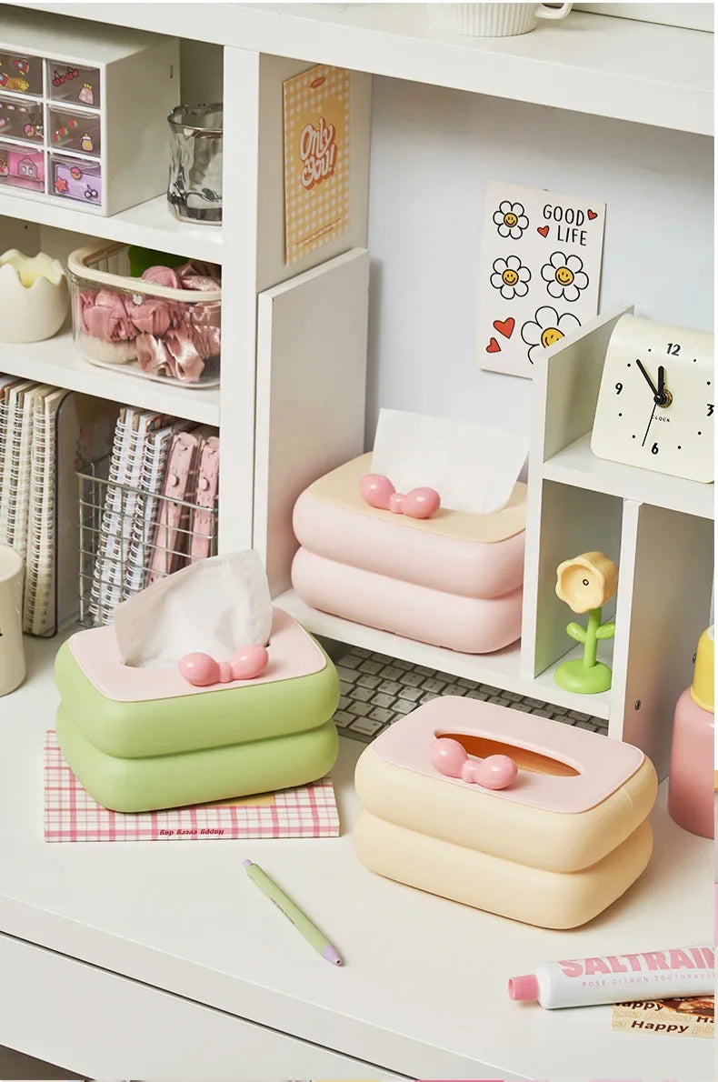 Cute spring-loaded automatic lift tissue box with large capacity storage drawer.