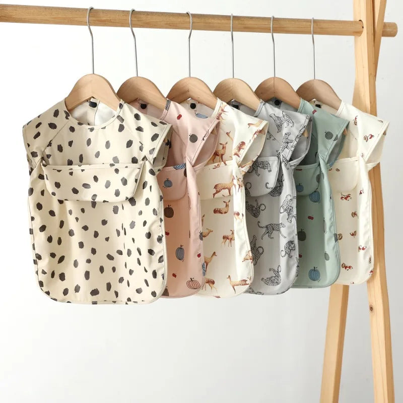 Baby Sleeveless Bibs Burp Cloth Soft Waterproof Children's Feeding Apron with Pocket Toddler Printed Art Smock for Boys Girls