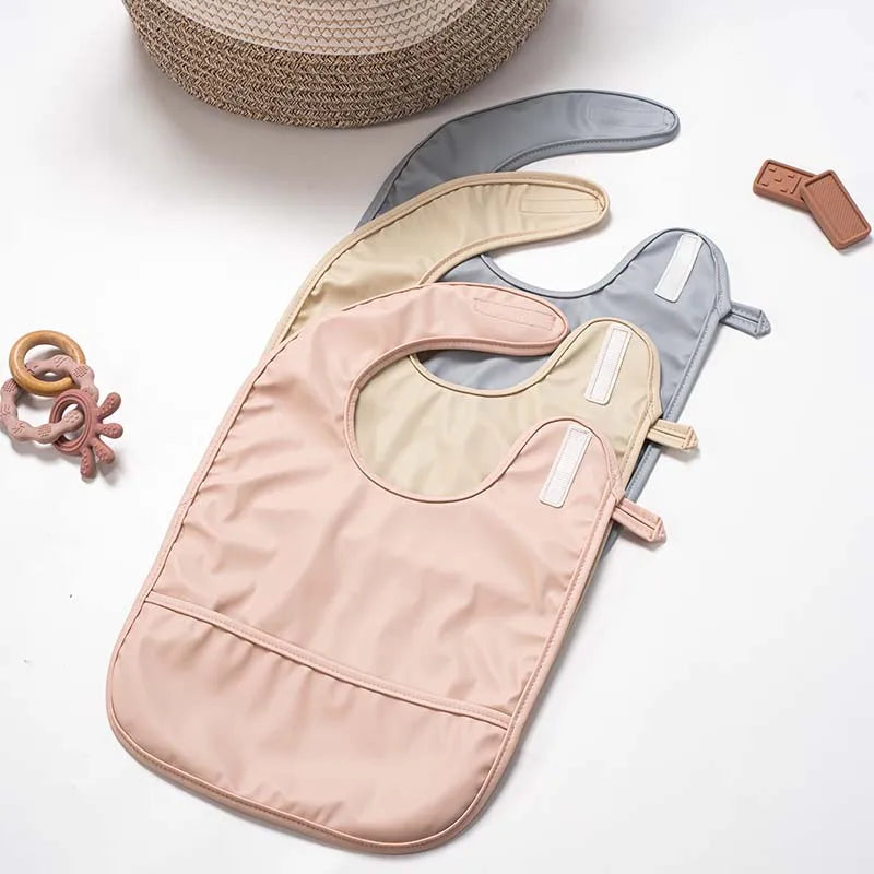 Sleeveless Baby Feeding Bibs Soft Waterproof Toddler Kids Anti-dirty Apron Solid Color Infant Saliva Bib with Pocket Baby Stuff