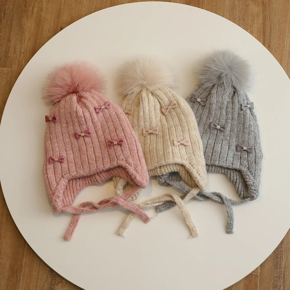 Princess Children Winter Hat for Girls Pompom Bows Kids Bonnet Hat Warm Ears Thicken Children Girl Cap Faux Fur Ball 2-6Y
