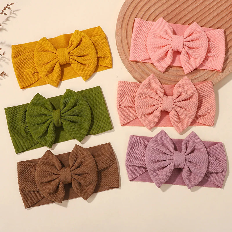12Pcs/lot big bows elastic headscarf for baby infant solid color casual headband The color is randomly distributed and not fixed